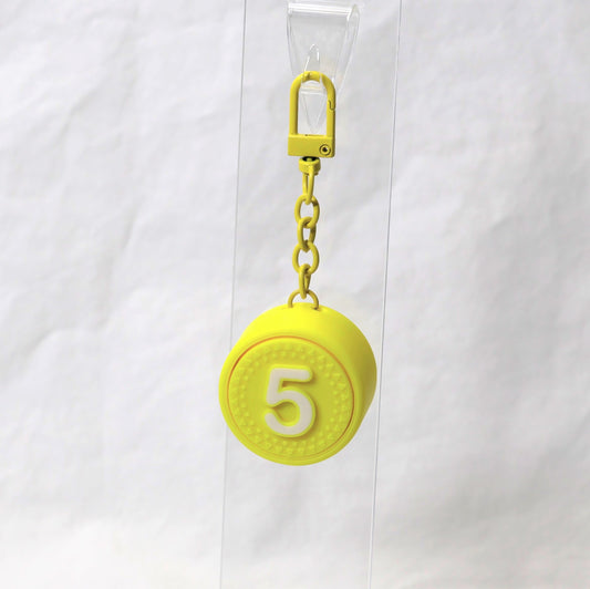 PLUK-PUCK clicker keychain