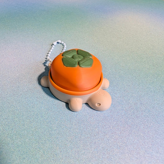 PERSIMMON TURTLE clicker keychain - SQUARES.WORKS