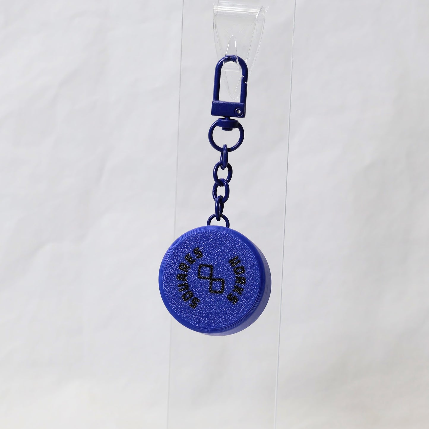 PLUK-PUCK clicker keychain