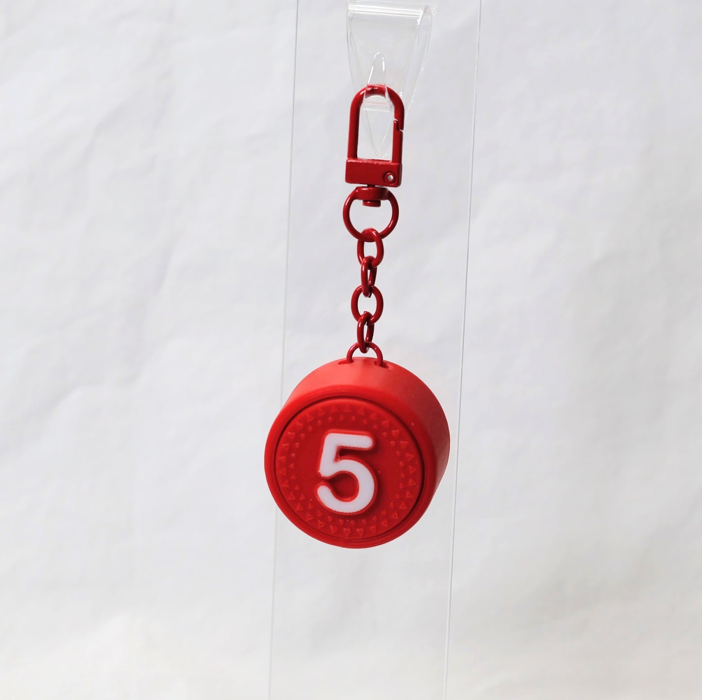PLUK-PUCK clicker keychain