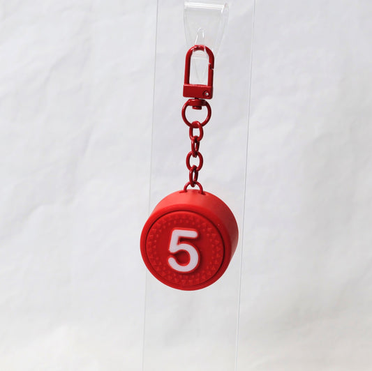 PLUK-PUCK clicker keychain