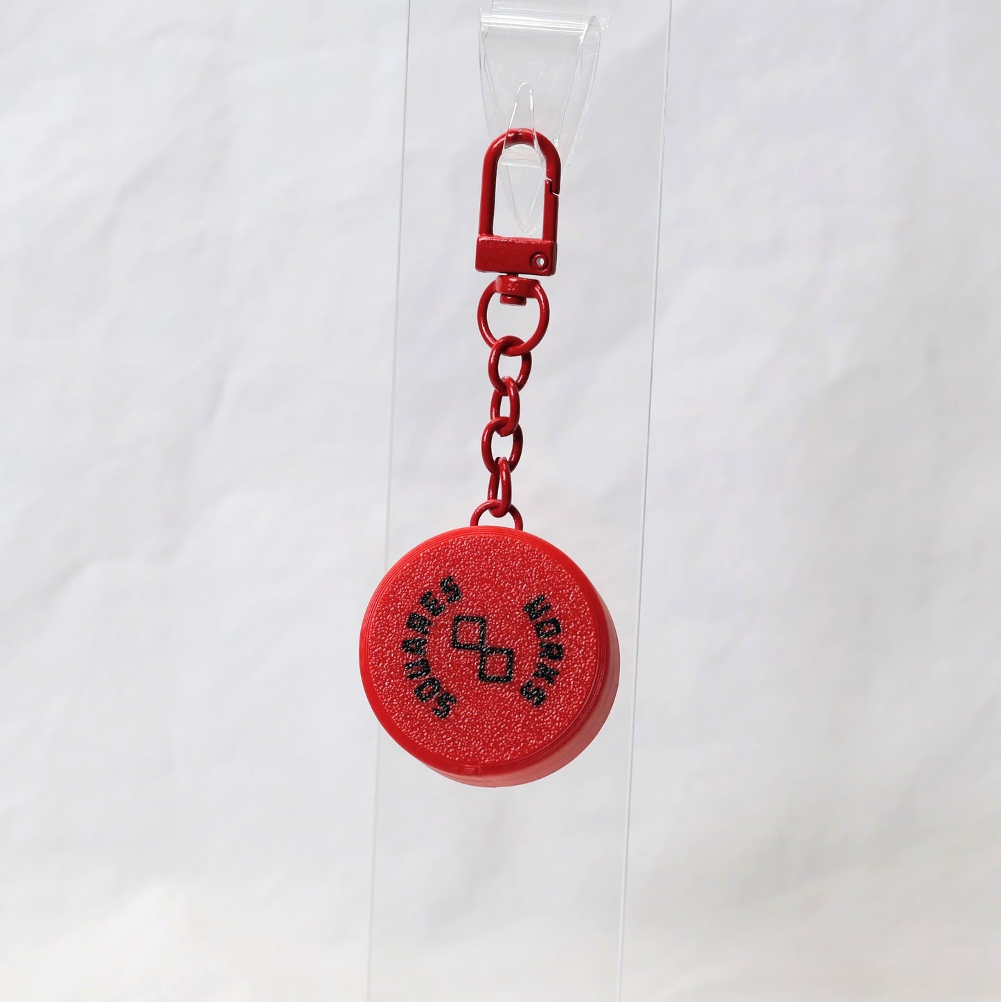PLUK-PUCK clicker keychain