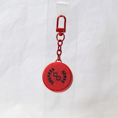 PLUK-PUCK clicker keychain