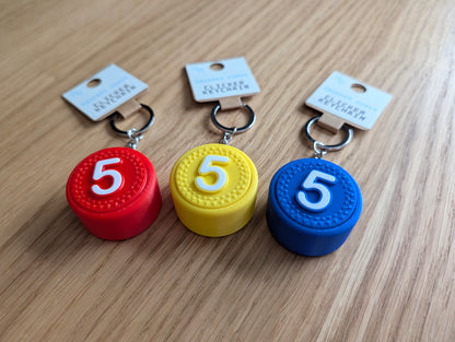 PLUK-PUCK clicker keychain