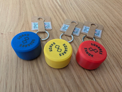 PLUK-PUCK clicker keychain